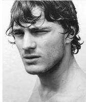 sexy actor Jamie Dornan picture with sexy curly hairstyle with and long bangs.JPG
