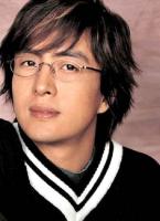 Asian actor Bae Yong Joon with layered medium long haircut