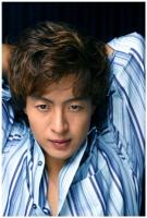 Bae Yong Joon with wavy hairstyle.jpg