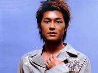 Asian actor Louis Koo with medium layered hair cut.jpg