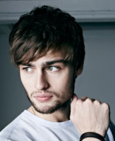Picture of Dough Booth with his short hairstyle with full of layers.PNG