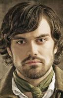 Man wavy medium haircut with wavy bangs pictures.JPG