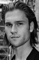 sexy man hairstyle wtih layers and very long bangs in the back.JPG