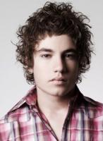 Young men curly hairstyle in medium long length with curly bangs photos.JPG
