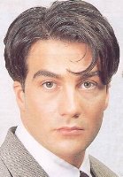 Picture of Men's Short Hair Style with long side bang and layers