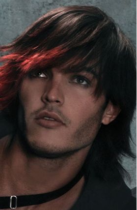 Long men haircut with funky long bang with bright red highlight.JPG
