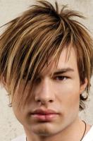 Trendy and cool men medium haircut with layered and high lights with very long side bangs.JPG
