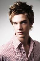 young medium short funky hairstyle with hight lights and spiky bangs and on the top.JPG