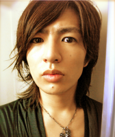 Asian man long layered haircut with swept bangs.PNG