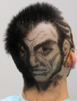Very unique haircut with human face picture.PNG