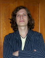 Man long curly hairstyle with very long side bangs.PNG
