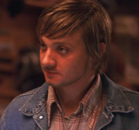 Movie actor Jeremy Renner with long hairstyle picture.PNG