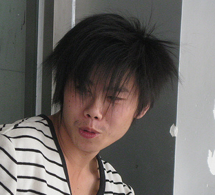 Spiky haircut for Asian man with full of layers.PNG
