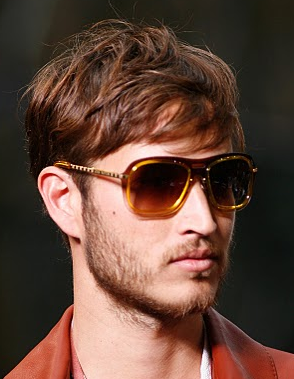 Very short classic men haircut with a trendy touch with layers and long bang.PNG
