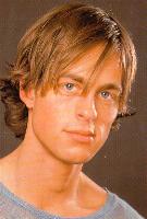Man medium hairstyle with long bangs in blonde