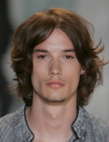 light curly men hairstyle with long side bangs with full of waves.PNG