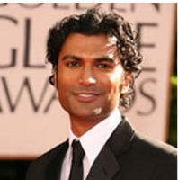Light curly wavy Indian men hairstyle in long length.PNG