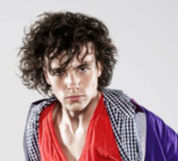 Men medium long wavy hairstyle with long bangs.PNG