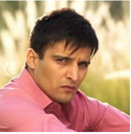 Indian men hairstyle with razored crop haircut with layered bangs.PNG
