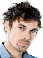 Men layered haircut with medium length and long wavy bangs.PNG