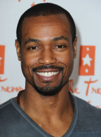 Hot black actor pictures of Isaiah Mustafa with very short haircut.PNG
