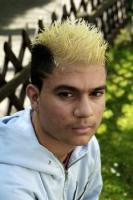 Boy short punk hairstyle in black and blonde
