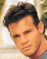 Man short wavy hair style